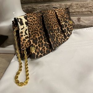 Jessica Simpson animal print clutch with gold wrist strap